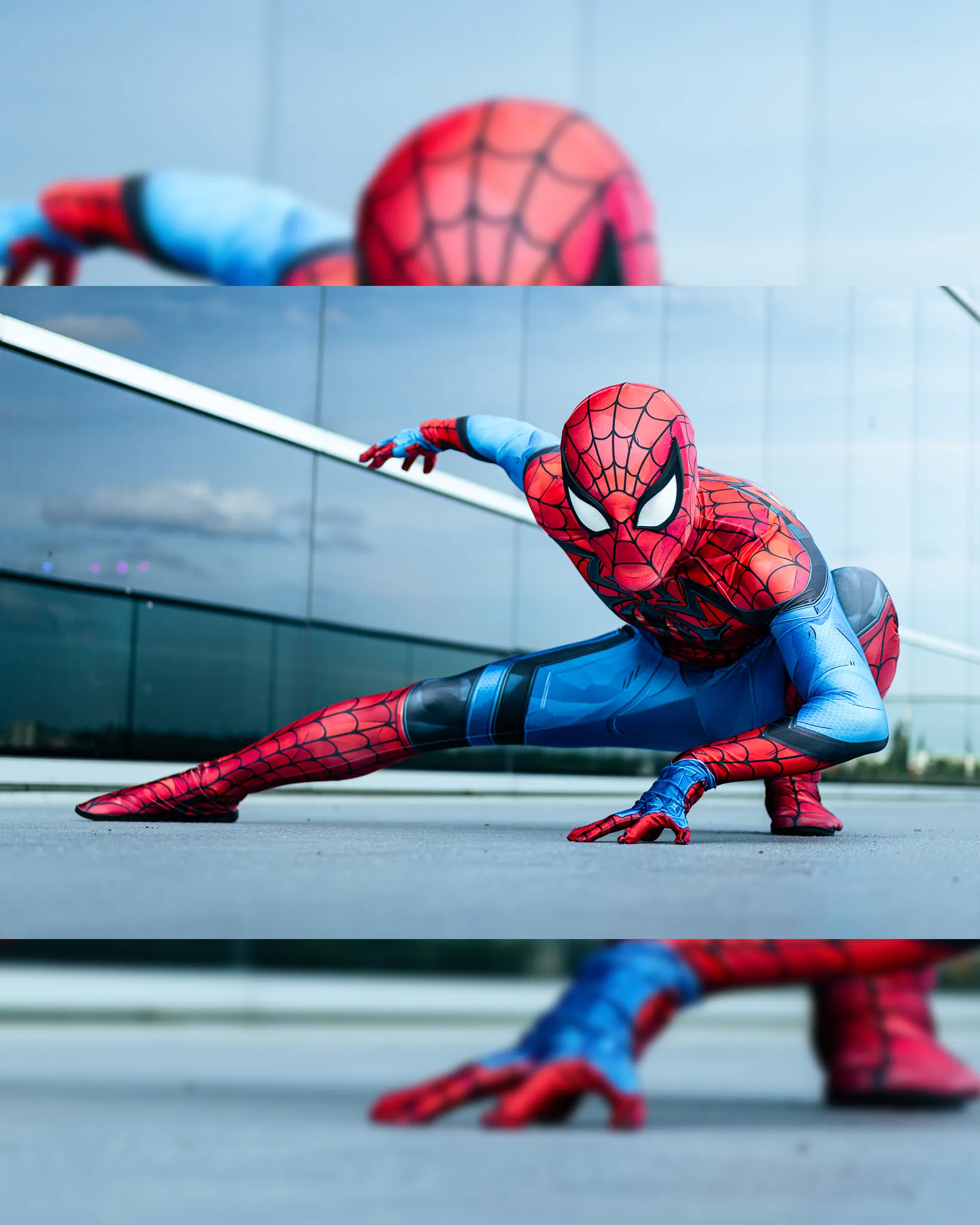 A cosplayer featuring spidermam posing low on the ground.