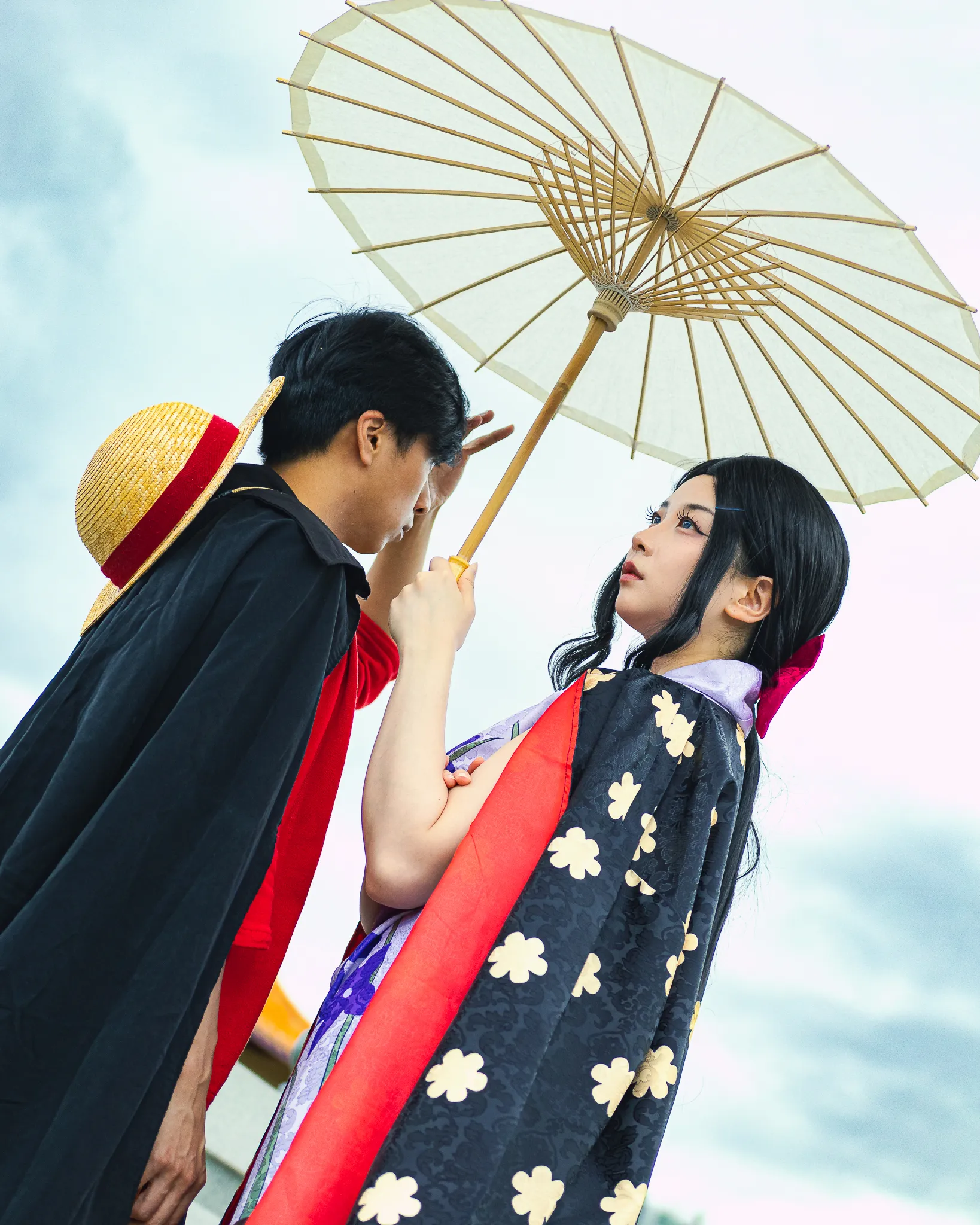 Cosplayers from the manga and anime series One Piece